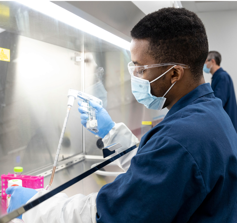 Image of a team member wearing protective equipment whilst working with the production of plasmid DNA for cell and gene therapies in King of Prussia, Pennsylvania